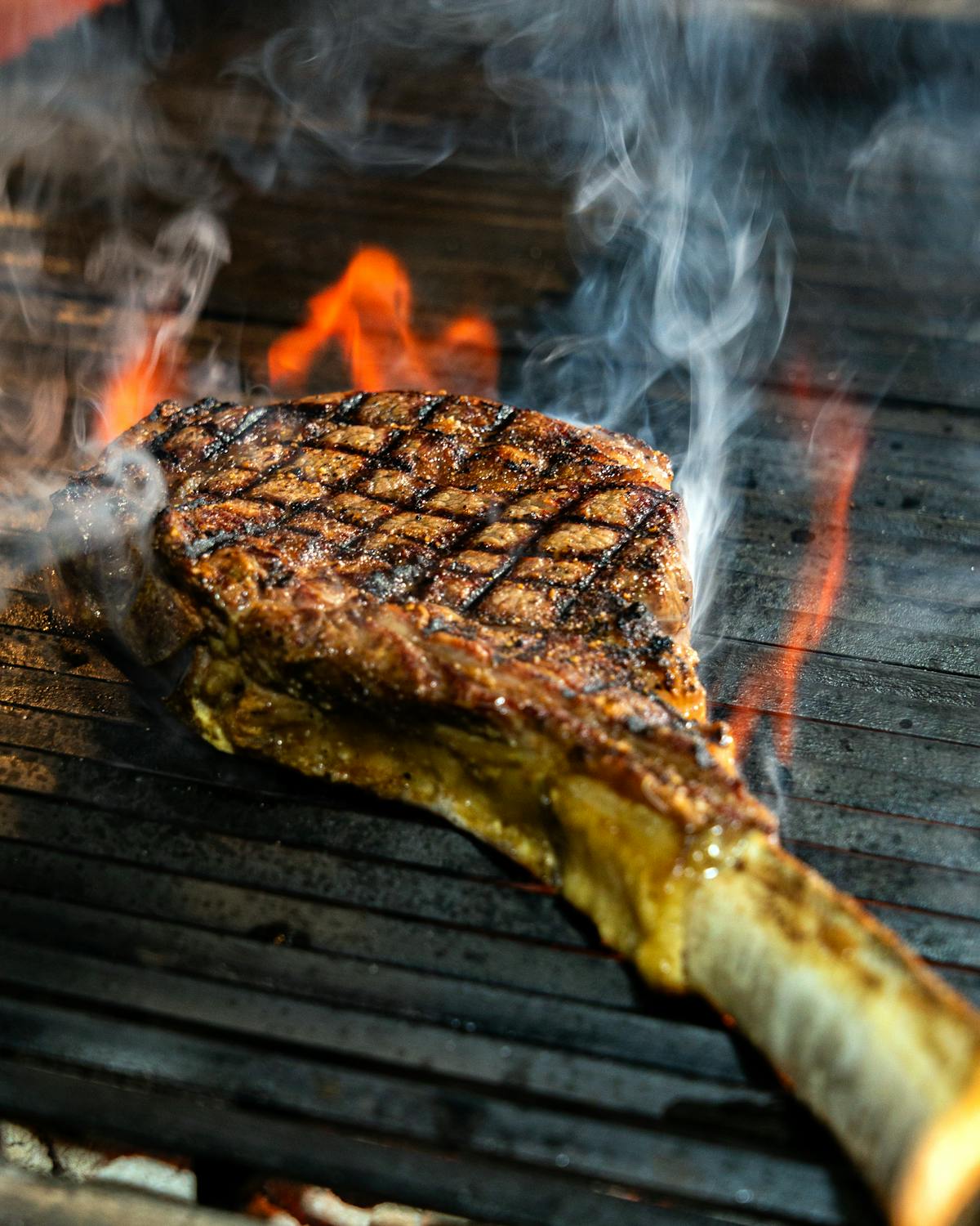 Reverse seared tri-tip steak sliced against the grain showing medium-rare pink interior